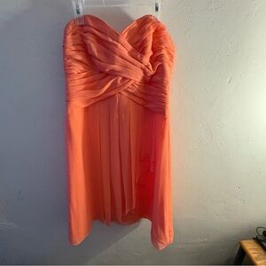 Elegant Coral Strapless Dress from David’s Bridal